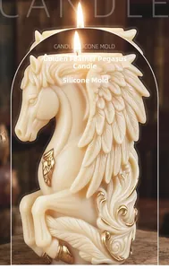Detailed view of golden feather pegasus silicone mold and finished white candle craft