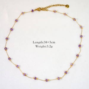 Gold stainless steel beaded necklace with purple square stones on a clean white background