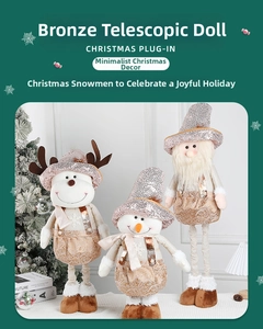 Detail of three retractable Christmas dolls with reindeer, snowman and Santa in bronze tones