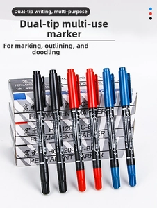 Macro view of double-headed permanent markers in red, blue, and black for precise drawing