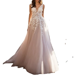 Detail of elegant V-neck sleeveless wedding dress with intricate floral embroidery
