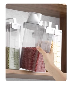 Detail of transparent grain storage container with measurement scales and airtight white lid