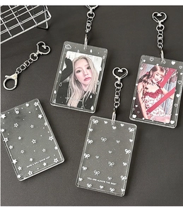 Clear acrylic photocard holder with glitter stars and heart keychain for K-pop cards