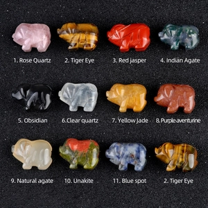 Miniature crystal pig figurines carved from natural rose quartz tiger eye and obsidian