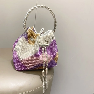 Sparkling rhinestone bucket bag with colorful crystal design and silver metal ring handles