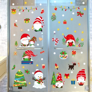 Christmas window decals with Santa Claus, snowmen and trees for festive glass decoration