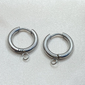 Pair of silver stainless steel hoop earrings with connector loops for DIY jewelry making