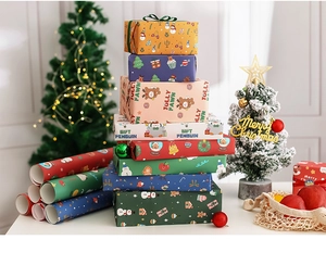 Detailed view of colorful Christmas wrapping paper with festive elk and snowman patterns