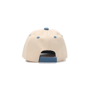 Adjustable beige and navy blue cotton baseball cap for babies with back strap detail
