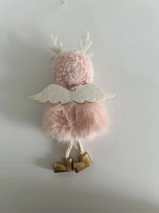 Pink plush angel doll with white felt wings, deer antlers and gold boots on white
