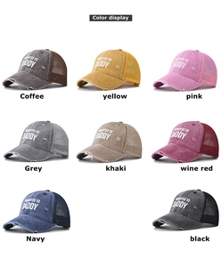 Detailed grid view of distressed trucker hats featuring Promoted To Daddy printed lettering