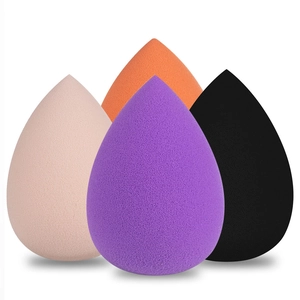 Set of 4 colorful non-latex makeup sponges in pink, orange, purple and black teardrop shapes