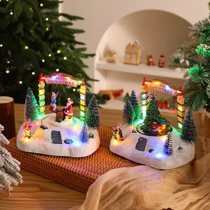 Boîte à musique de Noël en résine avec scène de patinage, sapin rotatif et lumière LED