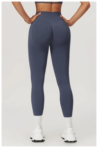 Detail of high waist seamless yoga pants with scrunch butt lifting texture in blue-gray