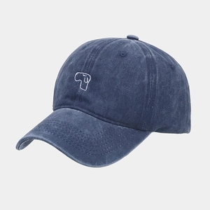 Detail of washed navy blue cotton baseball cap with white line embroidery on the side crown