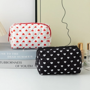 Quilted cotton heart pattern makeup bags in white and black with secure zippers