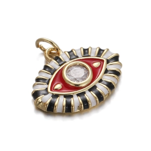 Detailed close-up of a golden Evil Eye pendant with red enamel and zircon stone inlay