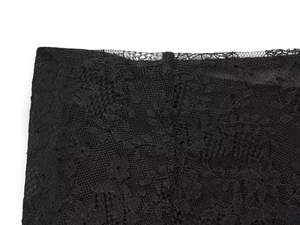 Detailed close-up showing the intricate black floral lace pattern and mesh texture