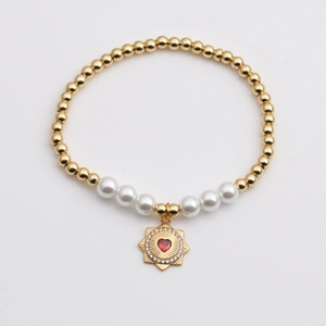 Fashion gold plated beaded bracelet with white pearls and a red heart star charm pendant