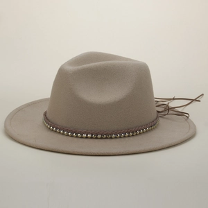Detail of khaki fedora hat with dark brown woven band, metallic beads and long leather fringe