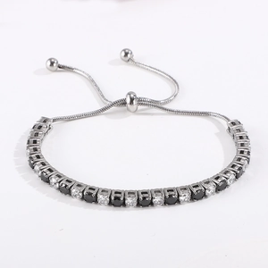 Detail of adjustable tennis bracelet with micro-paved black and white cubic zirconia
