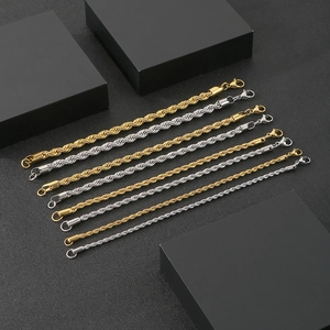 Detail of twisted rope chains in gold and silver steel showing 4mm to 8mm widths