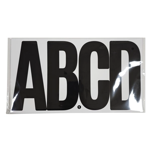 Close-up of 6-inch waterproof black alphabet stickers A B C D and number 1 on white background