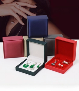 Detailed view of luxury brushed leather jewelry boxes for rings, necklaces and earrings