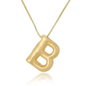 Macro shot of 3D puff letter B pendant in gold finish with delicate cable chain