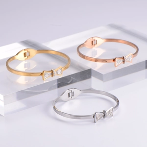 Bow knot stretch bracelets in gold, rose gold and silver finish with sparkling stones