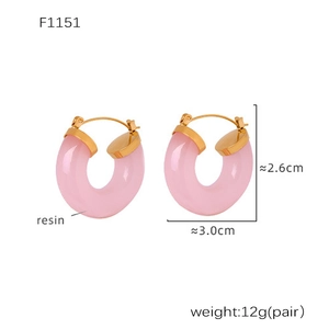 Detail view of pink resin hoop earrings with gold metal clasp and precise dimensions