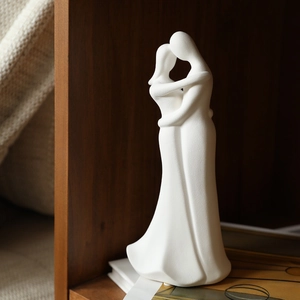 Modern white ceramic abstract couple sculpture for Nordic home decor with matte finish