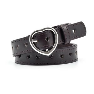 Detail of dark brown leather belt featuring heart-shaped hollow patterns and silver buckle