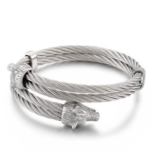 Rugged silver stainless steel cable bracelet featuring detailed double wolf heads for men