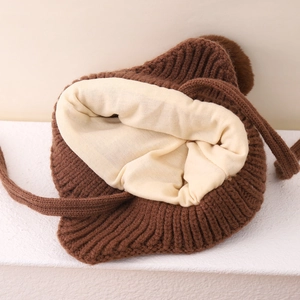 Winter knit bear earflap hat for kids with plush lining and dual faux fur pom-poms