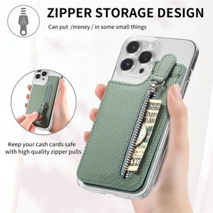 Close-up of sage green leather phone card holder with functional zipper and textured finish