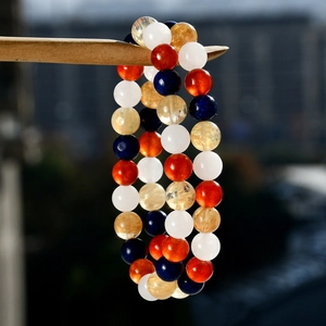 Detailed close-up of 8mm natural stone beads bracelet with agate and quartz stones