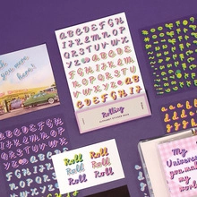 Macro view of multi-colored alphabet and number sticker pack for DIY journaling