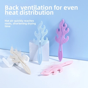 Detail view of vented hair brush design showing heat flow through the curved structure