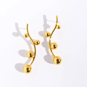 Fashionable gold ball drop earrings with wavy fluid lines and elegant metallic finish