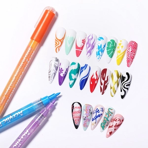 Detailed view of three acrylic paint markers for 3D nail art with colorful sample tips