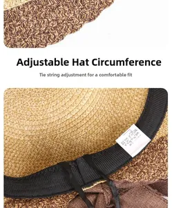 Detail of internal adjustable drawstring and woven texture of the summer straw sun hat