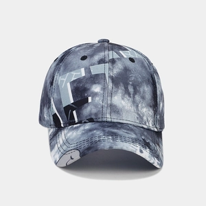 Detail of marble-patterned baseball cap showing high-quality stitching and fabric texture