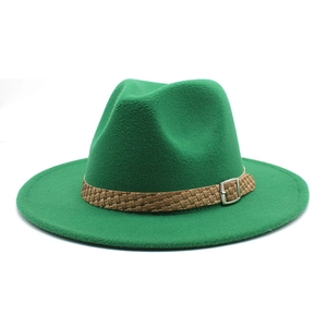 Close-up of green wool fedora hat with brown braided band and silver metal buckle