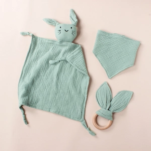 Sage green baby gift set with cotton muslin security blanket, bib and wooden teething ring