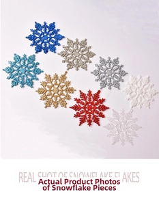 Detailed view of 24 pieces glitter snowflake ornaments in eight festive assorted colors