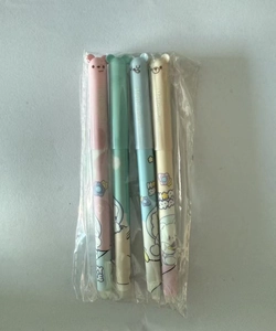 Detail of four colorful panda erasable gel pens with cute animal ears in a set