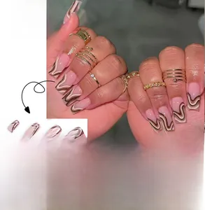 Detail of French wavy line press-on nails in long coffin shape with nude pink base