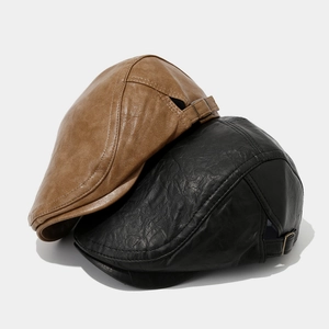 Vintage PU leather flat caps in black and brown featuring adjustable side buckles