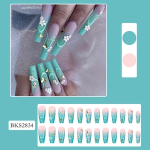 Long coffin fake nails with pink-green gradient, floral decor and golden butterflies